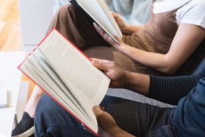 People reading books - Tips to improve English